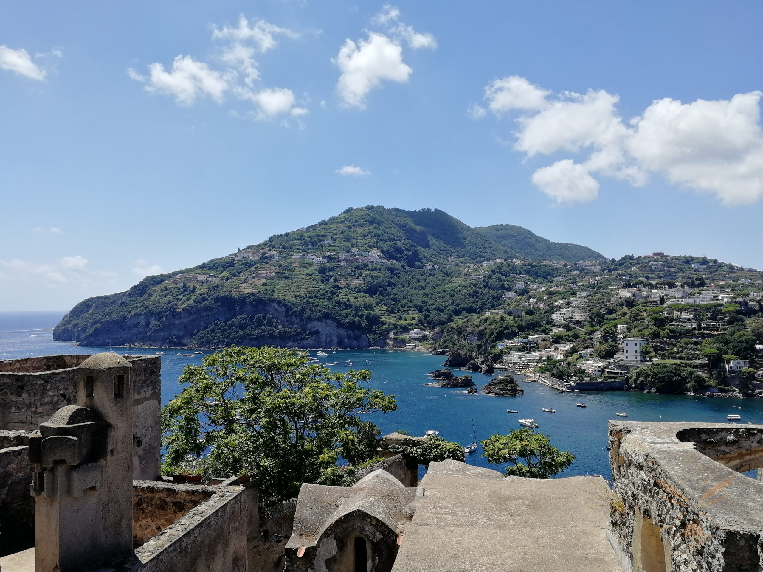 Sheltered bay and hillside homes in Ischia seen from the Aragonese Castle.