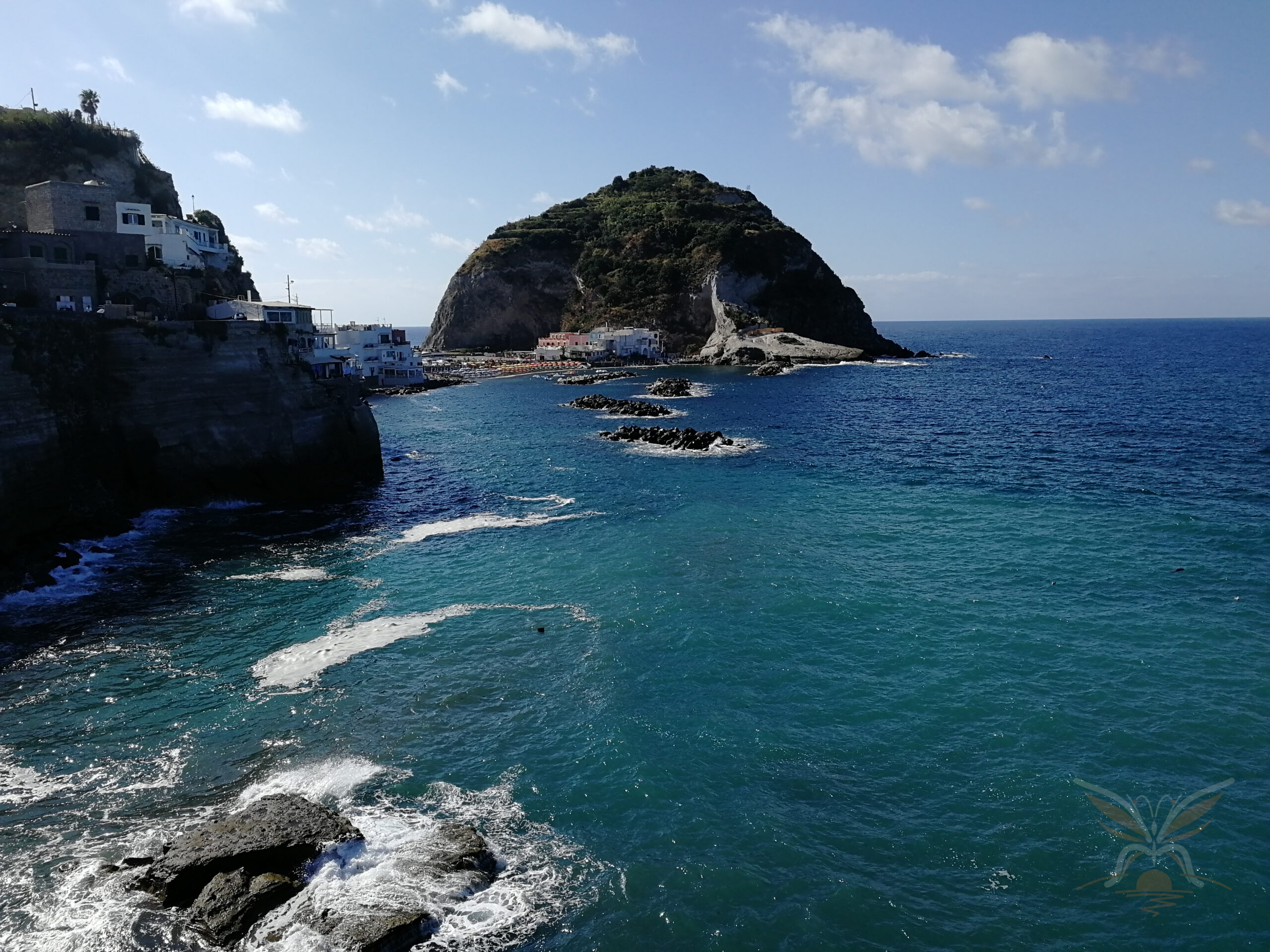 View of Sant’Angelo’s rocky islet and turquoise sea on the island of Ischia.